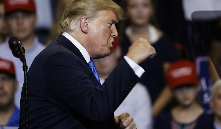 President Donald Trump gestures during a rally, Thursday, Aug. 2, 2018, at Mohegan Sun Arena at Casey Plaza in Wilkes Barre, Pa. (AP Photo/Matt Rourke)