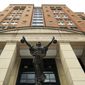 A statue adorns the front of the Albert V. Bryan United States Courthouse, Thursday, Aug. 2, 2018 in Alexandria, Va., where President Donald Trump&#39;s former campaign chairman Paul Manafort is on trial facing federal charges of tax evasion and bank fraud. (AP Photo/Manuel Balce Ceneta)