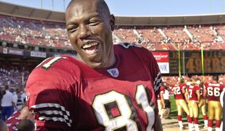 FILE - In this Oct. 6, 2002, file photo, San Francisco 49ers wide receiver Terrell Owens laughs in the last minute of the 49ers&#x27; 37-13 win over the St. Louis Rams in the fourth quarter of an NFL football game in San Francisco. Owens is skipping his induction ceremony into the Pro Football Hall of Fame in Canton, Ohio on Saturday, Aug. 4, 2018, and instead giving his acceptance speech at the University of Tennessee at Chattanooga.(AP Photo/Paul Sakuma, File)