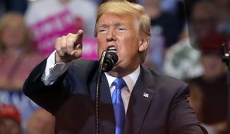 President Donald Trump speaks during a rally, Thursday, Aug. 2, 2018, at Mohegan Sun Arena at Casey Plaza in Wilkes Barre, Pa. (AP Photo/Carolyn Kaster)