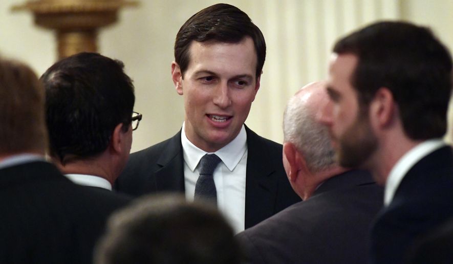 FILE - In this June 29, 2018, file photo, White House adviser Jared Kushner speaks with people as they wait for President Donald Trump to arrive to speak about taxes during an event in the East Room of the White House in Washington. U.S. officials say the Trump administration is staffing up a Middle East team at the White House in anticipation of rolling out its much-heralded but largely mysterious Israeli-Palestinian peace plan in the coming months. The National Security Council began last week to approach other agencies seeking volunteers to join the team, which will work for Trump’s Mideast peace pointmen Kushner and Jason Greenblatt, according to the officials. (AP Photo/Susan Walsh, File)