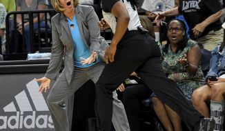 FILE - In this July 5, 2018, file photo, Minnesota Lynx coach Cheryl Reeve argues a foul call with an official, leading to a double technical foul and Reeve&#39;s ejection during the second half of the team&#39;s WNBA basketball game against the Los Angeles Sparks in Minneapolis. Technical fouls are up this year in the WNBA with more already called this season than last. There were 92 technical fouls given to players before the All-Star break. That&#39;s 11 more then all of last season. There were also 30 handed out to coaches already this season. There’s still nearly 20 percent of the season left to play. (Aaron Lavinsky/Star Tribune via AP, File)