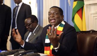 Zimbabwean President elect Emmerson Mnangagwa addresses a press conference in Harare, Friday, Aug, 3, 2018. Zimbabwe&#39;s president says people are free to approach the courts if they have issues with the results of Monday&#39;s election, which he carried with just over 50 percent of the vote. President Emmerson Mnangagwa spoke to journalists shortly after opposition leader Nelson Chamisa called the election results manipulated and said they would be challenged in court. (AP Photo/Tsvangirayi Mukwazhi)