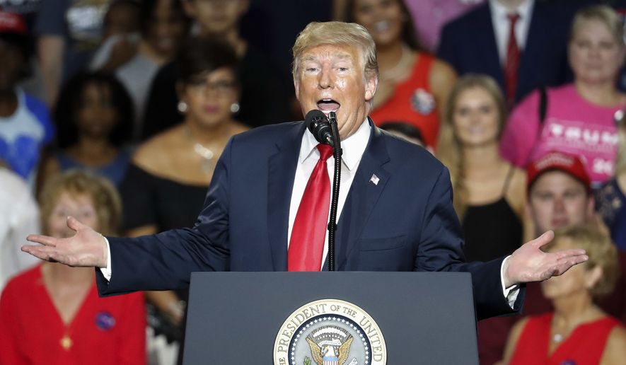 President Donald Trump speaks during a rally, Saturday, Aug. 4, 2018, in Lewis Center, Ohio. (AP Photo/John Minchillo)