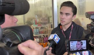 David Hogg, a student at Marjory Stoneman Douglas High School, speaks outside a Publix Supermarket in Coral Springs, Fla., Friday, May 25, 2018. (AP Photo/Terry Spencer) ** FILE **