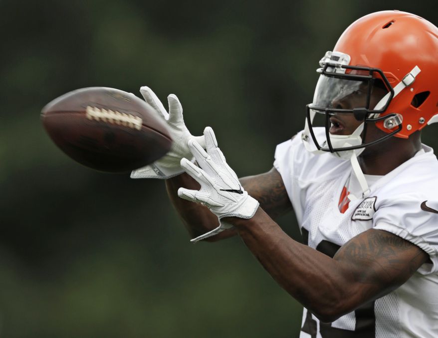 FILE - In this Friday, July 27, 2018, file photo, Cleveland Browns wide receiver Corey Coleman catches a pass during NFL football training camp, in Berea, Ohio. On Sunday, Aug. 5, 2018, a person familiar with the negotiations says the Cleveland Browns have agreed to trade disappointing wide receiver Corey Coleman to the Buffalo Bills for a draft pick. (AP Photo/Tony Dejak, File)