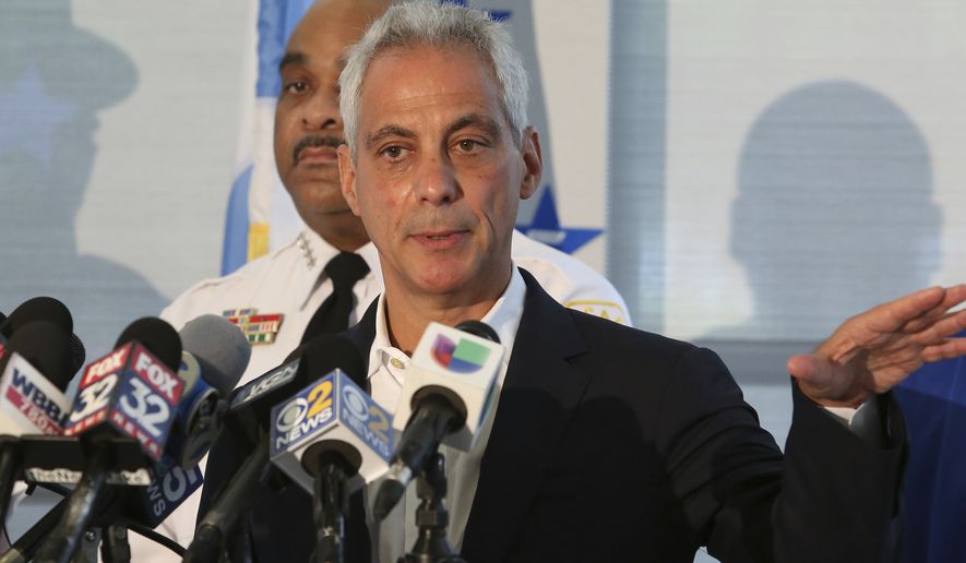 Chicago Mayor Rahm Emanuel speaks at a news conference accompanied by Police Superintendent Eddie Johnson, Monday, Aug. 6, 2018, in Chicago. Between 3 p.m. Friday, Aug. 3 and 6 a.m. Monday morning local time, police say at least 11 people were killed and about 70 were wounded in Chicago. Emanuel said one lesson from the wave of weekend violence is that people who live in neighborhoods where the shootings occurred have to be willing to name potential suspects. (AP Photo/Teresa Crawford)