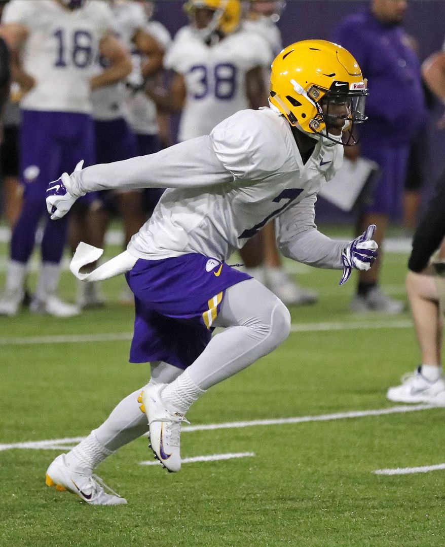LSU wide receiver Jonathan Giles (7) runs through drills during their NCAA college football practice in Baton Rouge, La., Monday, Aug. 6, 2018. (AP Photo/Gerald Herbert)