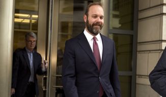 Rick Gates leaves federal court in Washington, Friday, Feb. 23, 2018. Gates, a former top adviser to President Donald Trump&#39;s campaign pleaded guilty in the special counsel&#39;s Russia investigation to federal conspiracy and false statements charges. (AP Photo/Jose Luis Magana) ** FILE **