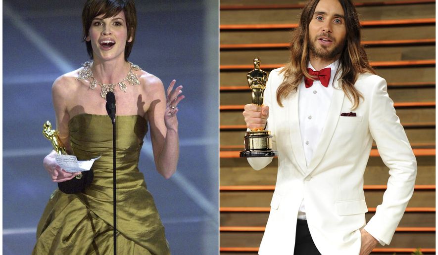 In this combination photo, Hilary Swank accepts the Oscar for best actress for her role in "Boys Don't Cry" during the 72nd Academy Awards in Los Angeles on March 26, 2000, left, and Jared Leto poses with his Oscar for best supporting actor for "Dallas Buyer Club" at the 2014 Vanity Fair Oscar Party in West Hollywood, Calif., on March 2, 2014. Swank and Leto portrayed transgender characters. (AP Photo)