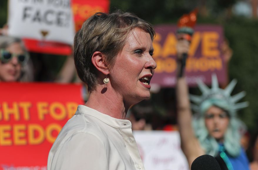 FILE - In this July 10, 2018 file photo, New York gubernatorial candidate Cynthia Nixon speaks during a pro-choice rally in New York. Nixon’s economic development plan calls for investments in green jobs, minority communities and crumbling infrastructure. The former “Sex and the City” star and Democratic candidate for New York governor also wants greater transparency and accountability in state economic development spending. The candidate’s plan was first reported Tuesday, Aug. 7 by The Associated Press. (AP Photo/Julie Jacobson)