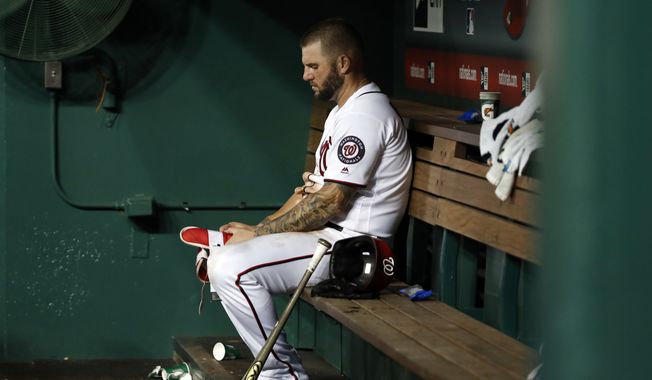 Washington Nationals' Matt Adams sits in the dugout after the Atlanta Braves' 8-3 win in a baseball game Wednesday, Aug. 8, 2018, in Washington. (AP Photo/Alex Brandon) ** FILE **