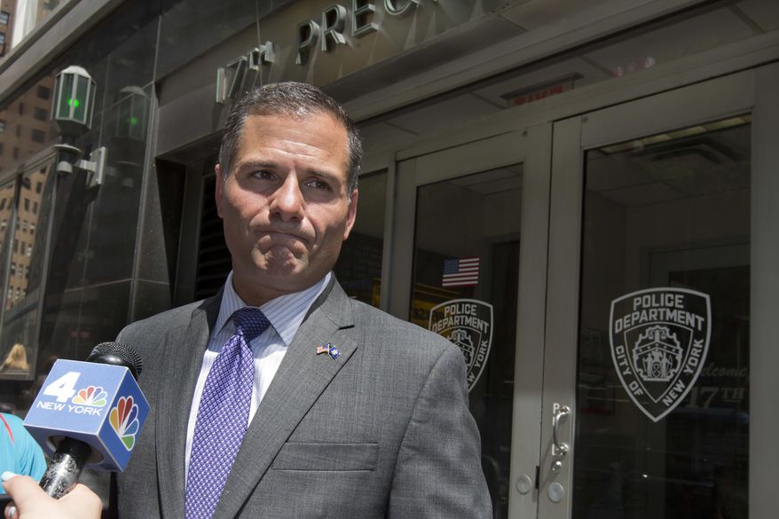 Republican New York gubernatorial candidate Marc Molinaro holds a news conference outside the New York City Police Department's 17th Precinct, in New York, Wednesday, Aug. 8, 2018.  Molinaro attempted to file a formal police complaint on behalf of New York state taxpayers against New York Governor Andrew Cuomo for "allegedly breaking the law at his New York City offices in Manhattan over a period of 68 days in 2014." (AP Photo/Richard Drew)
