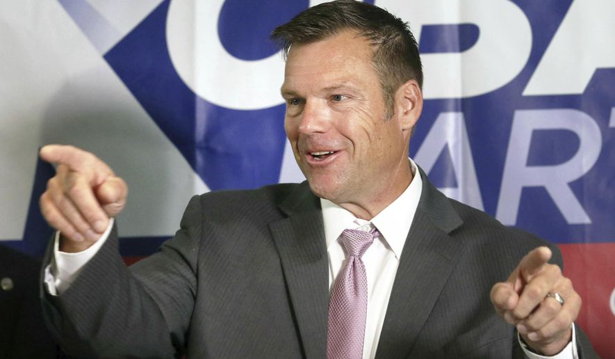 Secretary of State Kris Kobach spoke to the media during a news conference at the Topeka Capitol Plaza hotel in Topeka, Kan., Wednesday, Aug. 8, 2018. (Thad Allton /The Topeka Capital-Journal via AP)