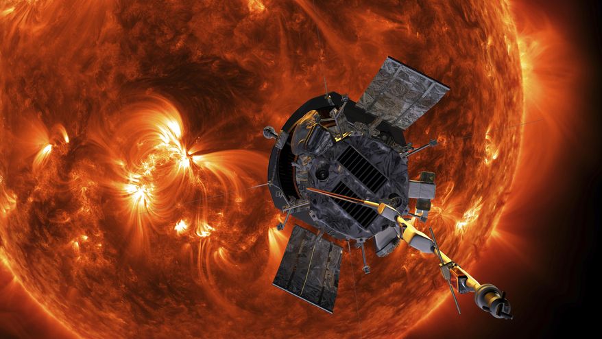 This image made available by NASA shows an artist's rendering of the Parker Solar Probe approaching the Sun. It's designed to take solar punishment like never before, thanks to its revolutionary heat shield that’s capable of withstanding 2,500 degrees Fahrenheit (1,370 degrees Celsius). (Steve Gribben/Johns Hopkins APL/NASA via AP)