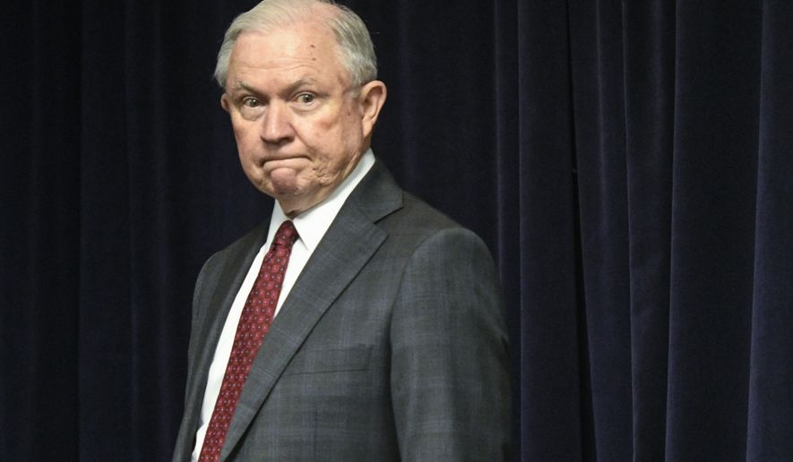 Attorney General Jeff Sessions is pictured before delivering remarks on efforts to combat violent crime in America during an appearance at the United States Attorney&#39;s Office for the Middle District of Georgia on Thursday August 9, 2018, in Macon, Ga. (AP Photo/John Amis)