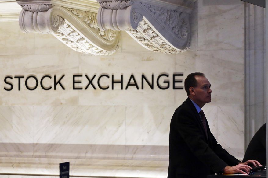 FILE- In this Jan. 2, 2018, file photo, a trader works at the New York Stock Exchange. The U.S. stock market opens at 9:30 a.m. EDT on Thursday, Aug 9. (AP Photo/Mark Lennihan, File)