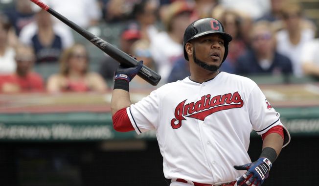 Cleveland Indians' Edwin Encarnacion reacts after striking out against Minnesota Twins starting pitcher Jose Berrios in the fourth inning of a baseball game, Thursday, Aug. 9, 2018, in Cleveland. (AP Photo/Tony Dejak)