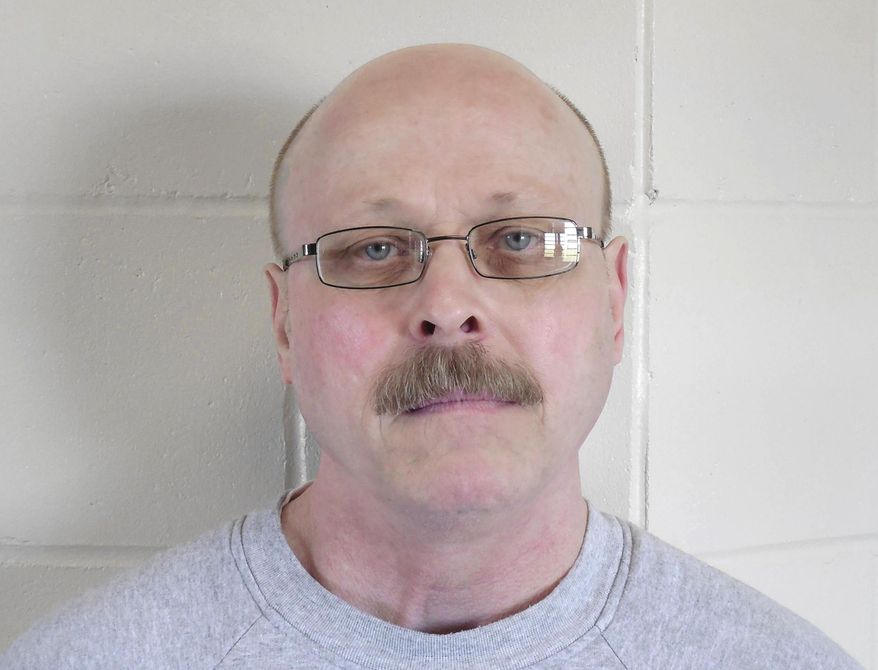 FILE - This file photo provided by the Nebraska Department of Correctional Services shows death-row inmate Carey Dean Moore. A federal judge is set to decide Friday, Aug. 10, 2018, whether Nebraska can proceed with the state's first execution since 1997 and its first-ever lethal injection. U.S. District Court Judge Richard Kopf is expected to issue the ruling in a lawsuit by a German pharmaceutical company that alleges state officials improperly obtained the company's drugs for Moore’s execution which is set for Tuesday morning Aug. 14. He was condemned for the 1979 murders of two Omaha cab drivers. (Nebraska Department of Correctional Services via AP, File)