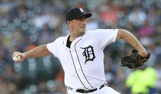Detroit Tigers starting pitcher Jordan Zimmermann throws during the first inning of a baseball game against the Minnesota Twins, Friday, Aug. 10, 2018, in Detroit. (AP Photo/Carlos Osorio)