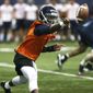 File- This March 27, 2018, file photo shows Virginia&#39;s Bryce Perkins throwing a shuffle pass during the NCAA college football team&#39;s practice in Charlottesville, Va. Virginia coach Bronco Mendenhall know there&#39;s a risk in going all in on the performance of a few players to determine his team&#39;s success, especially when an injury to one of them can damage the team&#39;s psyche. The third-year coach is doing it anyway when it comes to transfer quarterback Bryce Perkins and wide receiver and running back Olamide Zaccheaus, perhaps the two fastest offensive players on the Cavaliers&#39; roster. (Zach Wajsgras/The Daily Progress via AP, File)