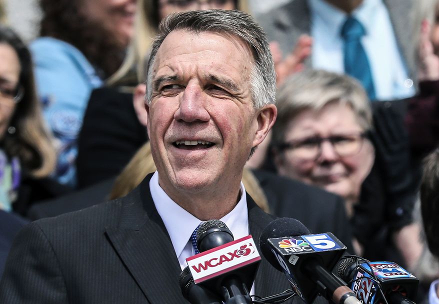 FILE - In this April 11, 2018 file photo, Vermont Gov. Phil Scott speaks before signing a gun restrictions bill on the steps of the Statehouse in Montpelier, Vt. The moderate Republican governor has been a critic of President Donald Trump&#39;s policies on everything from immigration to tariffs, sentiments echoed by many in the Vermont Republican Party. (AP Photo/Cheryl Senter, File)