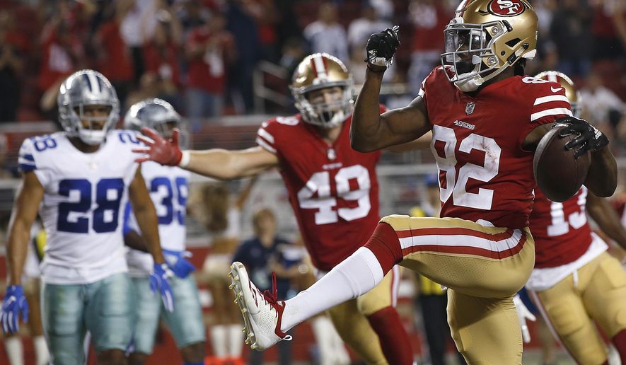 San Francisco 49ers wide receiver Richie James (82) celebrates after scoring a touchdown against the Dallas Cowboys during the second half of an NFL preseason football game in Santa Clara, Calif., Thursday, Aug. 9, 2018. (AP Photo/Josie Lepe)