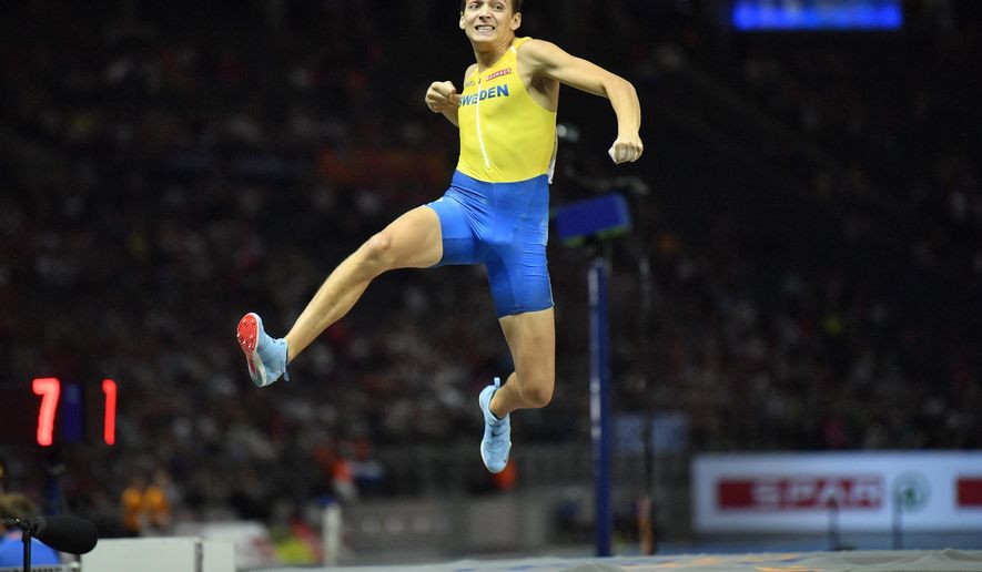 Sweden's Armand Duplantis celebrates after an attempt in the men's pole vault final at the European Athletics Championships in the Olympic stadium in Berlin, Germany, Sunday, Aug. 12, 2018. (AP Photo/Martin Meissner)
