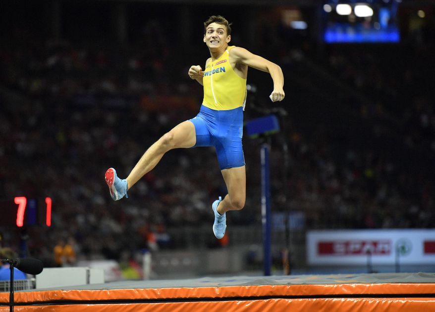 Sweden's Armand Duplantis celebrates after an attempt in the men's pole vault final at the European Athletics Championships in the Olympic stadium in Berlin, Germany, Sunday, Aug. 12, 2018. (AP Photo/Martin Meissner)