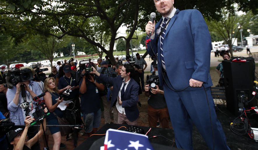 White nationalist Jason Kessler talks during a rally near the White House on the one year anniversary of the Charlottesville &amp;quot;Unite the Right&amp;quot; rally, Sunday, Aug. 12, 2018, in Washington. (AP Photo/Alex Brandon)