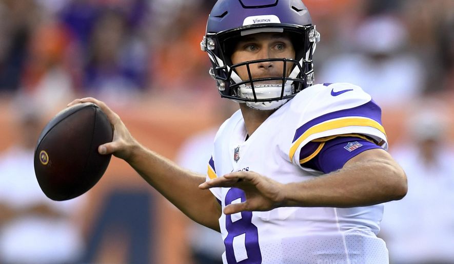 Minnesota Vikings quarterback Kirk Cousins looks to throw a pass against the Denver Broncos during the first half in an NFL preseason football game Saturday, Aug. 11, 2018, in Denver. (AP Photo/Mark Reis)