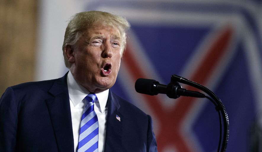 President Donald Trump speaks at Fort Drum, N.Y., Monday, Aug. 13, 2018, before a signing ceremony for a $716 billion defense policy bill named for Sen. John McCain. (AP Photo/Carolyn Kaster)