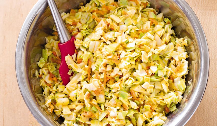 This undated photo provided by America's Test Kitchen in July 2018 shows Memphis chopped coleslaw in Brookline, Mass. This recipe appears in “The Complete Cook’s Country TV Show Season 10 Cookbook.” (Carl Tremblay/America's Test Kitchen via AP)