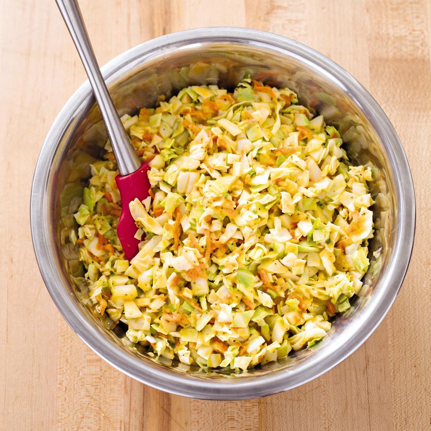 This undated photo provided by America's Test Kitchen in July 2018 shows Memphis chopped coleslaw in Brookline, Mass. This recipe appears in “The Complete Cook’s Country TV Show Season 10 Cookbook.” (Carl Tremblay/America's Test Kitchen via AP)