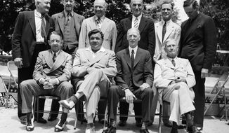 File - In this June 12, 1939 file photo, these baseball stars were pictured as they attended the dedication and their induction into the Baseball Hall of Fame in Cooperstown, N.Y. Front row; Eddie Collins, Babe Ruth, Connie Mack, Cy Young; Rear row left to right; Hans Wagner, Grover Cleveland Alexander, Tris Speaker, Napoleon Lajoie, George Sisler and Walter Johnson. A baseball with the signatures of Babe Ruth, Ty Cobb, Honus Wagner and eight other legends of the game has sold for more than $600,000. The players all signed the ball on the same day in 1939, when they had gathered to become the first class to enter the Baseball Hall of Fame. SCP Auctions said Monday, Aug. 13, 2018, that it has sold for just over $623,000. That crushes the previous record of $345,000 for a signed ball, set in 2013. (AP Photo/File)