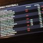 This Aug. 1 2018 photo shows a board at Harrah&#x27;s casino in Atlantic City, N.J., listing the odds on pro football games in the first week of the NFL season. Resorts casino will begin taking sports bets in person on Wednesday, Aug. 15, becoming the fifth Atlantic City casino to do so. (AP Photo/Wayne Parry) ** FILE **
