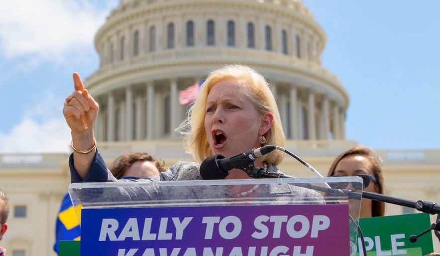 Sen. Kirsten Gillibrand, D-N.Y., joins protesters objecting to President Donald Trump&#x27;s Supreme Court nominee Judge Brett M. Kavanaugh, at a rally Capitol in Washington, Wednesday, Aug. 1, 2018. (AP Photo/J. Scott Applewhite)