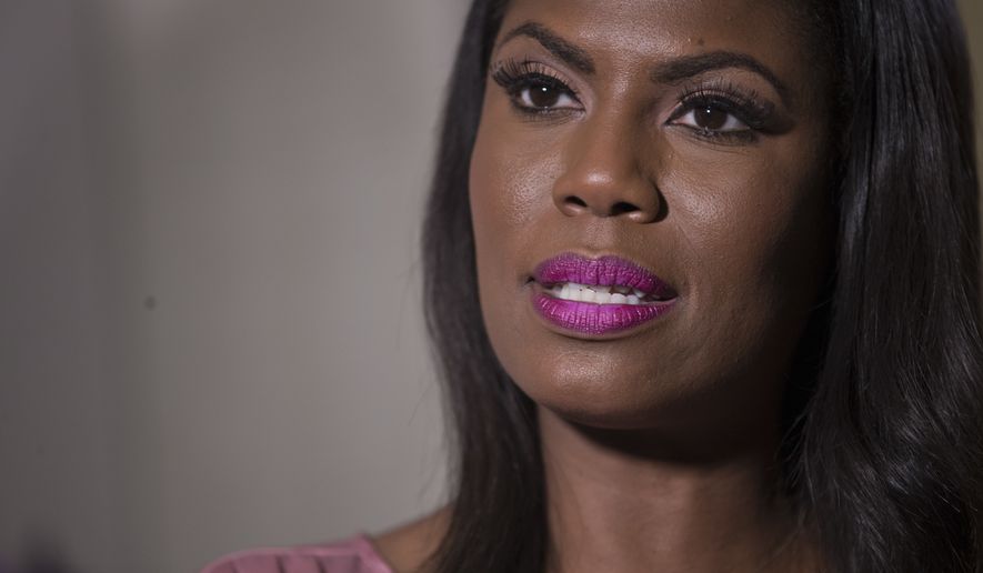 Television personality and former White House staffer Omarosa Manigault Newman speaks during an interview with The Associated Press, Tuesday, Aug. 14, 2018, in New York. (AP Photo/Mary Altaffer)