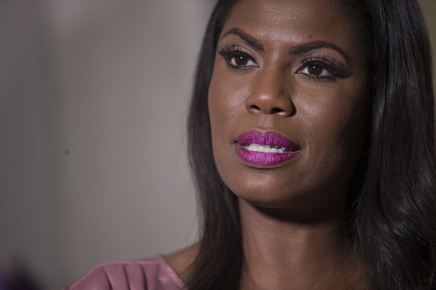 Television personality and former White House staffer Omarosa Manigault Newman speaks during an interview with The Associated Press, Tuesday, Aug. 14, 2018, in New York. (AP Photo/Mary Altaffer)