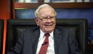 In this May 7, 2018, photo, Berkshire Hathaway Chairman and CEO Warren Buffett smiles during an interview in Omaha, Neb., with Liz Claman on Fox Business Network&#39;s &amp;quot;Countdown to the Closing Bell.&amp;quot; Buffett&#39;s company added to its stakes in Apple and Israeli drugmaker Teva Pharmaceuticals in the second quarter while tweaking several of its other stock investments. Berkshire Hathaway Inc. filed an update on its U.S. stock portfolio with the Securities and Exchange Commission on Tuesday, Aug. 14. (AP Photo/Nati Harnik)