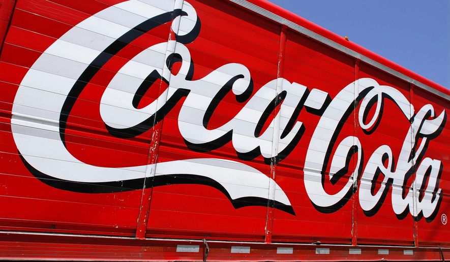 This June 25, 2012, file photo shows the Coca-Cola logo on the side of a delivery truck in Springfield, Ill. (AP Photo/Seth Perlman, File)