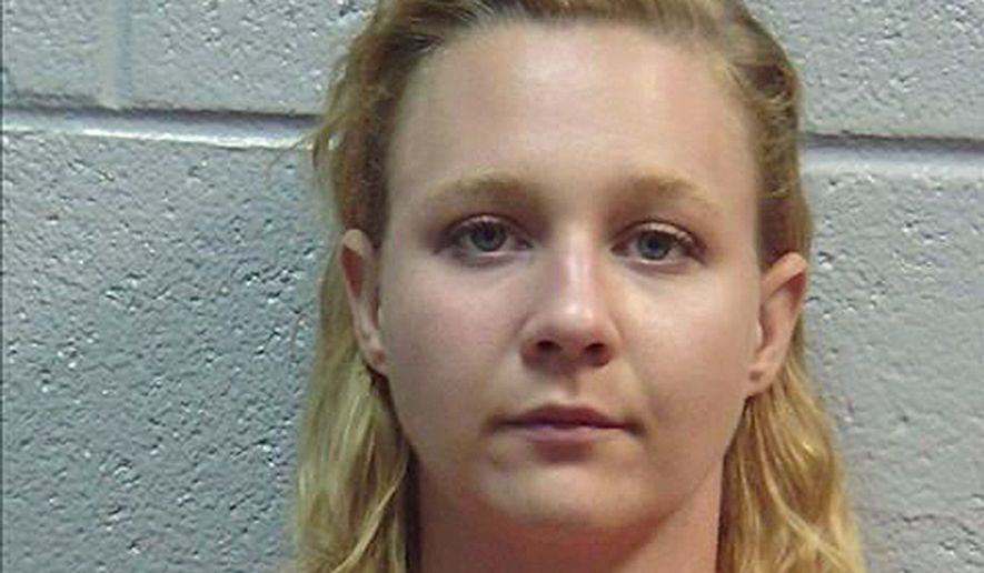 FILE - This June 2017 file photo released by the Lincoln County, Ga., Sheriff&#39;s Office, shows Reality Winner. Winner, of Georgia, who mailed a secret U.S. report to a news organization faces the &quot;longest sentence&quot; ever behind bars for a federal crime involving leaks to the news media, prosecutors said in a court filing. Former National Security Agency contractor Winner, 26, is scheduled to be sentenced Aug. 23, 2018, by a U.S. District Court judge in Augusta. (Lincoln County Sheriff&#39;s Office via AP, File)