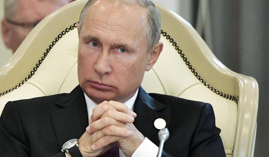Russian President Vladimir Putin, attends a meeting during the 5th Caspian summit in Aktau, the Caspian Sea port in Kazakhstan, Sunday, Aug. 12, 2018. (Alexei Nikolsky, Sputnik, Kremlin Pool Photo via AP)