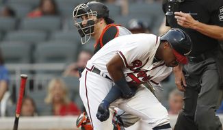 Atlanta Braves&#39; Ronald Acuna Jr. (13) reacts after being hit by a pitch from Miami Marlins&#39; Jose Urena during the first inning of a baseball game Wednesday, Aug. 15, 2018, in Atlanta. Both dugouts emptied and Urena was ejected. (AP Photo/John Bazemore)