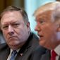 President Donald Trump, accompanied by Secretary of State Mike Pompeo, left, speaks during a cabinet meeting in the Cabinet Room of the White House, Thursday, Aug. 16, 2018, in Washington. (AP Photo/Andrew Harnik)