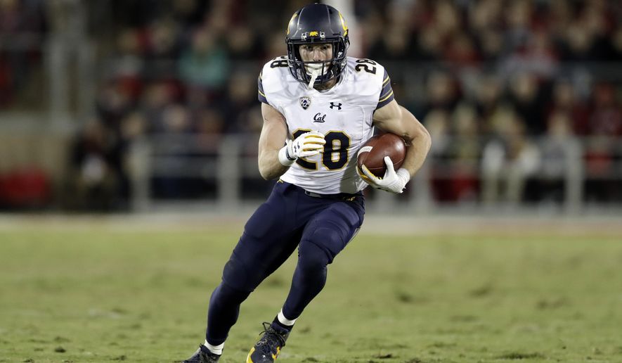 FILE - In this Nov. 18, 2017, file photo, California running back Patrick Laird runs against Stanford during the first half of an NCAA college football game in Stanford, Calif. Cal now hopes that the increased focus on defense that led to 14 fewer points per game allowed and the culture change that head coach Justin Wilcox instilled in year one leads to a bowl game this season. "It's a transition to more of a winning mentality," running back Patrick Laird said. "In the past, there's been not a victim mentality, but things are tough, it's hard for us to win. Now we feel like we can win. ... Everyone collectively feels we are capable of winning and we can do it." (AP Photo/Marcio Jose Sanchez, File)