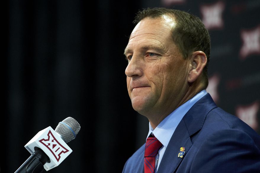 FILE - In this July 16, 2018, file photo, Kansas football head coach David Beaty speaks during NCAA college football Big 12 media days in Frisco, Texas. Beaty has plenty of reasons to be feeling the pressure this season. The biggest is his record, which is just 3-33 in three seasons at Kansas (AP Photo/Cooper Neill, File)