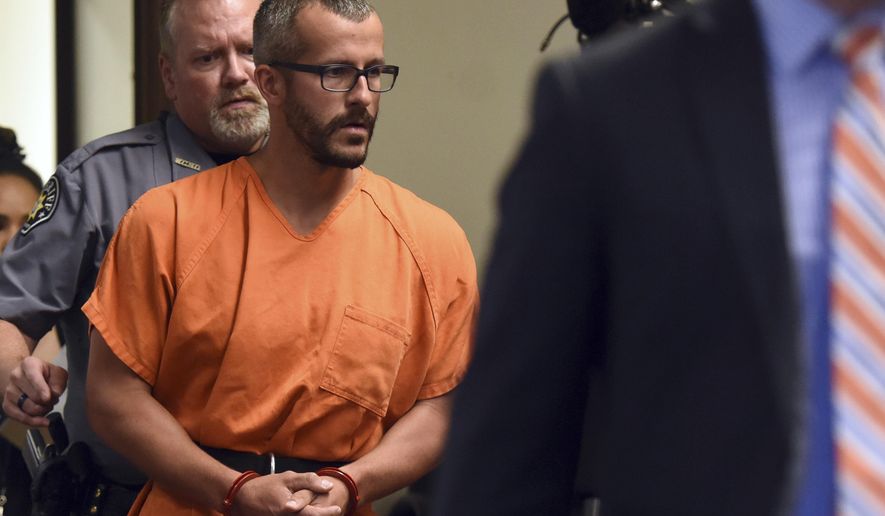 Christopher Watts is escorted into the courtroom before his bond hearing at the Weld County Courthouse on Thursday, Aug. 16, 2018, in Greeley, Colo. Watts, of Colorado, whose wife and daughters disappeared this week was arrested on suspicion of killing them. (Joshua Polson/The Greeley Tribune via AP, Pool)