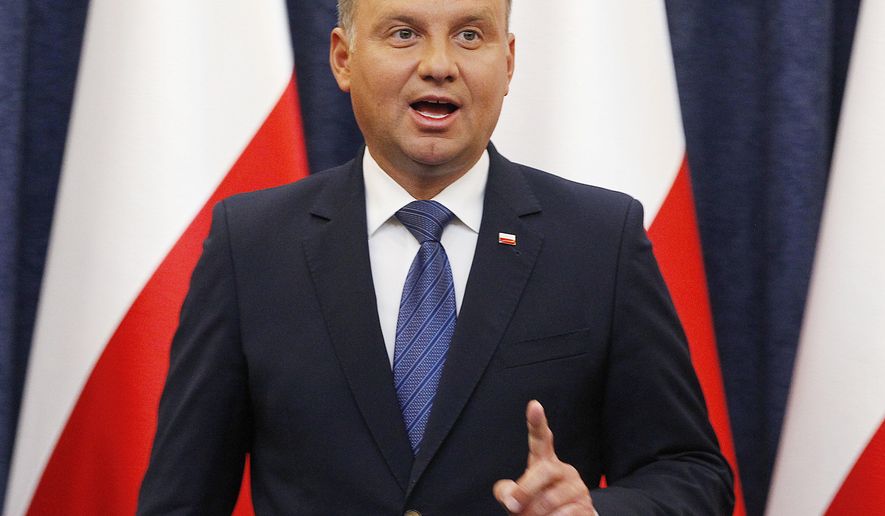 Polish President Andrzej Duda announces that he is vetoing a law on elections to the European Union Parliament that would have benefited large political parties and made it harder for small parties to reach a threshold to get seats, in Warsaw, Poland, Thursday, Aug. 16, 2018. (AP Photo/Czarek Sokolowski)