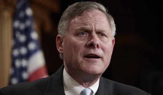 In this March 29, 2017, file photo, Senate Intelligence Committee Chairman Sen. Richard Burr, R-N.C., speaks to reporters about his panel&#39;s investigation of Russian interference in the 2016 election, on Capitol Hill in Washington. (AP Photo/J. Scott Applewhite)